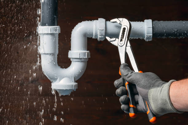 Professional Emergency Plumber technician working in Clay, NY
